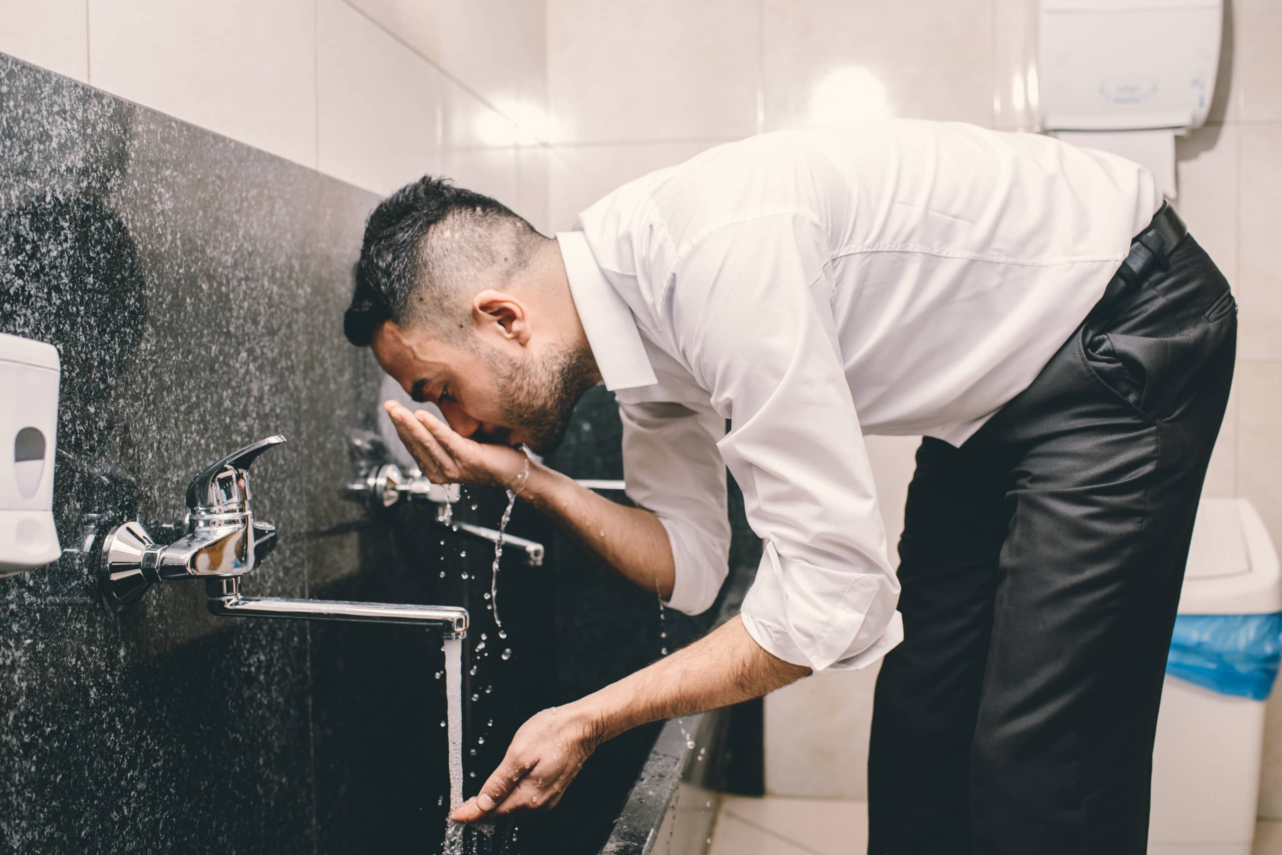 Muslim,Person,Washing,His,Mouth,And,Nose,Before,The,Prayer